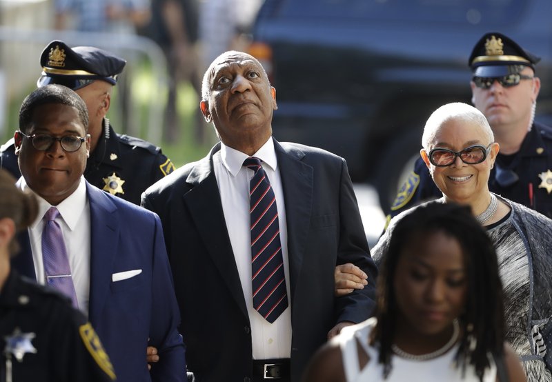 Bill Cosby arrives for his sexual assault trial with his wife Camille Cosby, right, at the Montgomery County Courthouse in Norristown, Pa., Monday, June 12, 2017. (AP Photo/Matt Rourke)