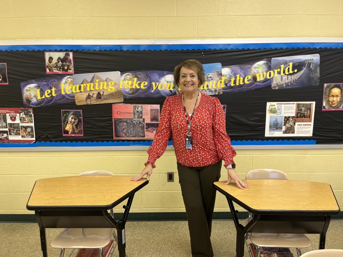 Ms. Suzanne Daywalt ready to take down her room decor for the last time before retirement.