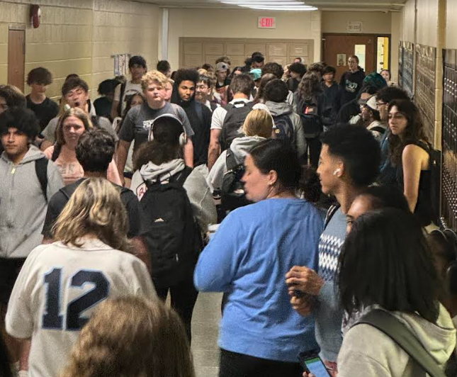 Students+shuffle+through+the+crowded+hallways+of+North+Penn+High+School.