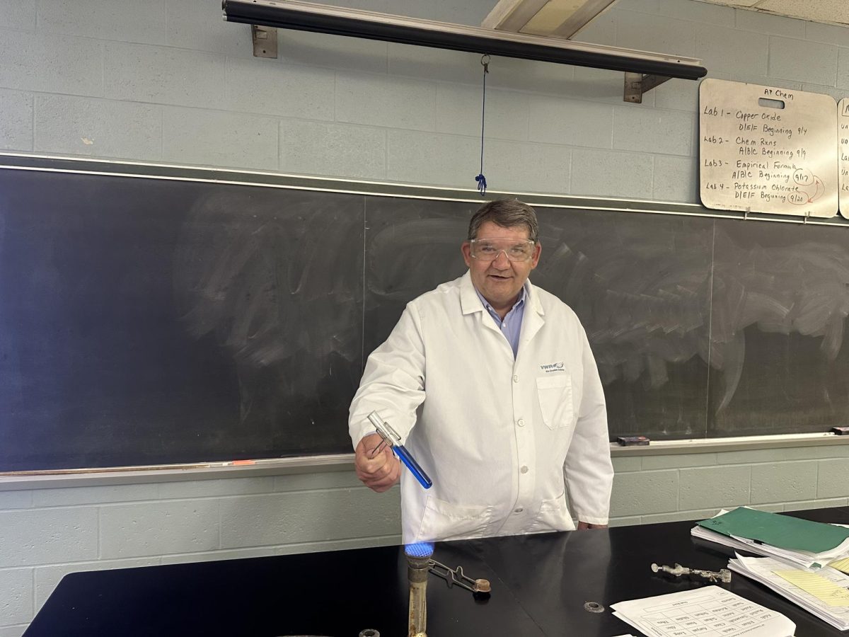 Chemistry in the Classroom: Mr. Mark Keagy fires up the bunsen burner for Chem class at NPHS