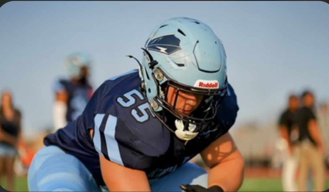 North Penn's , Vinny Montmore, getting ready to snap the ball. 