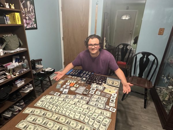 Navigation to Story: For Dominik DiSanto coin collecting includes a passion for history