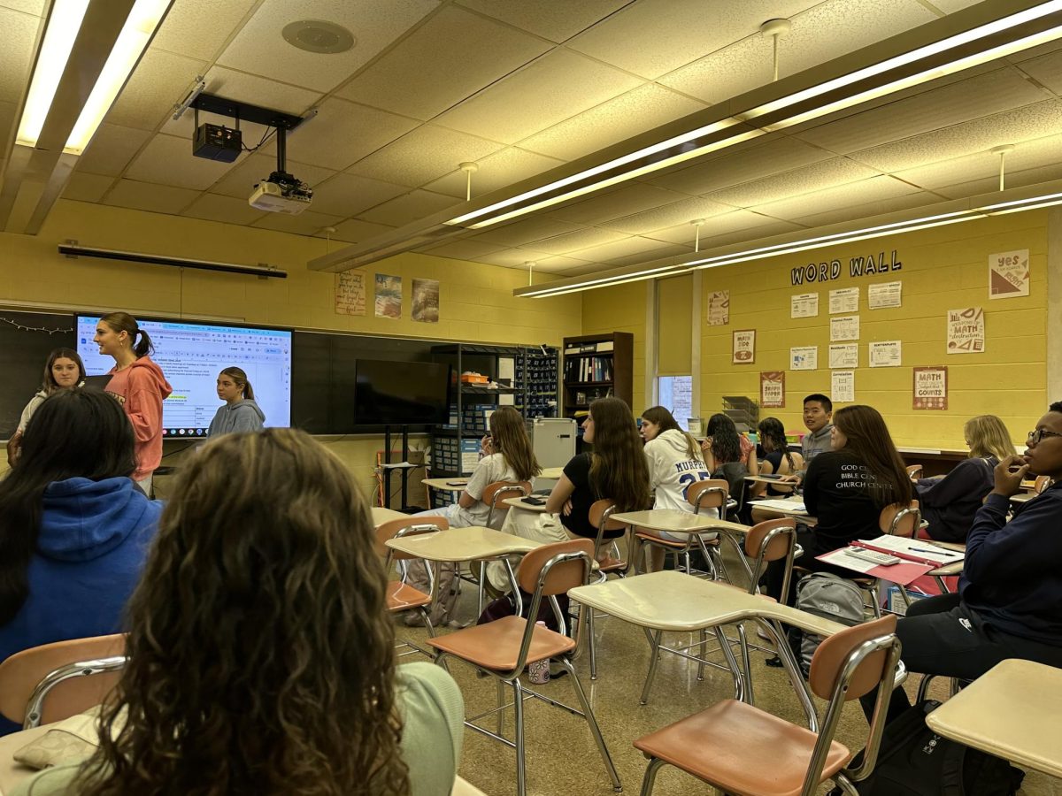 Class Cabinet hard at work during their morning meeting.