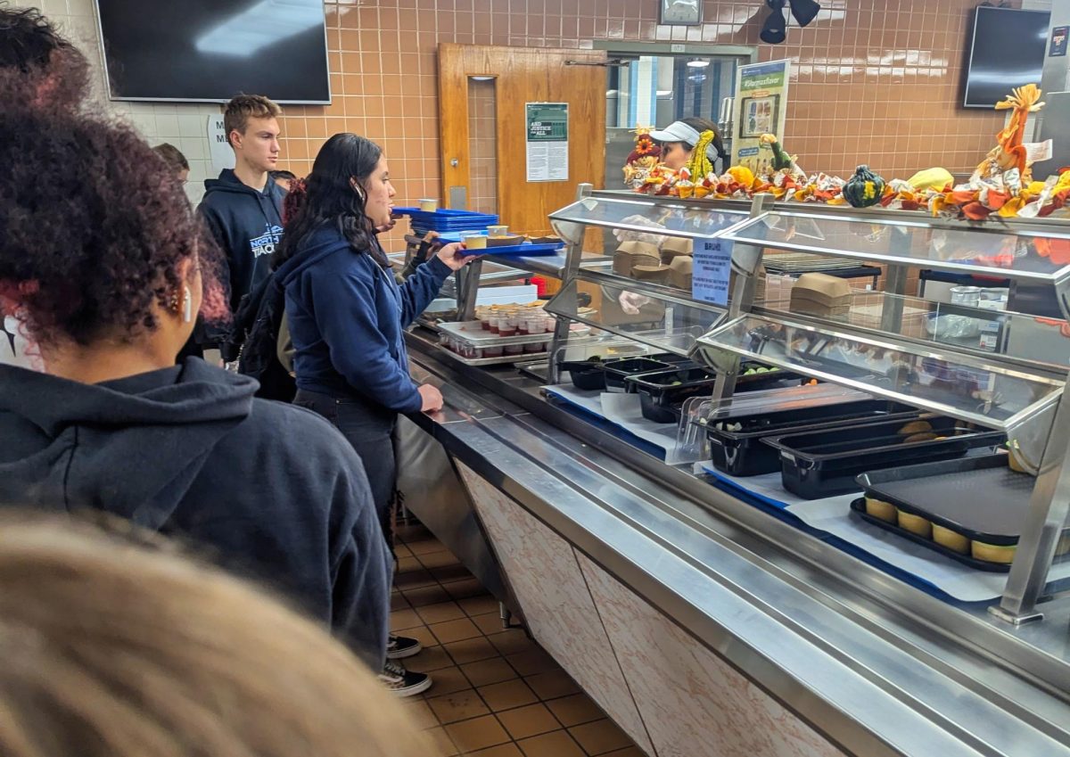 North Penn High School students stand in line to get school lunches, which are much different than their European counterparts.