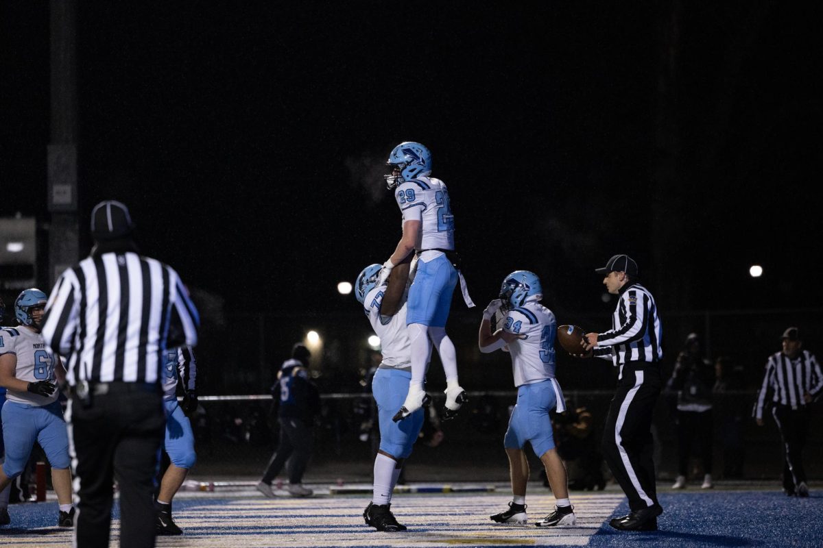 North Penn's Matt Pownall celebrates a touchdown in the 2024 District final at Downingtown West. 