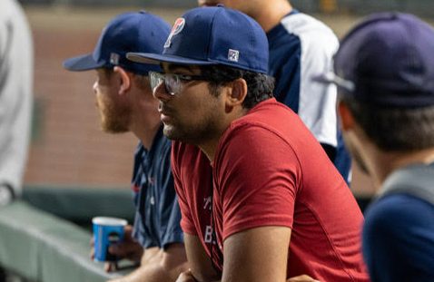 Prasham Jobanputra in the Penn Baseball dugout during his internship as Baseball Support Staff, Analytics, and Operations intern. 