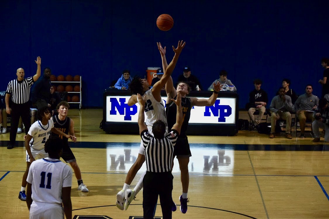 North Penn's Gabe Altemus tips off to start the game vs CB West on December 13, 2024.