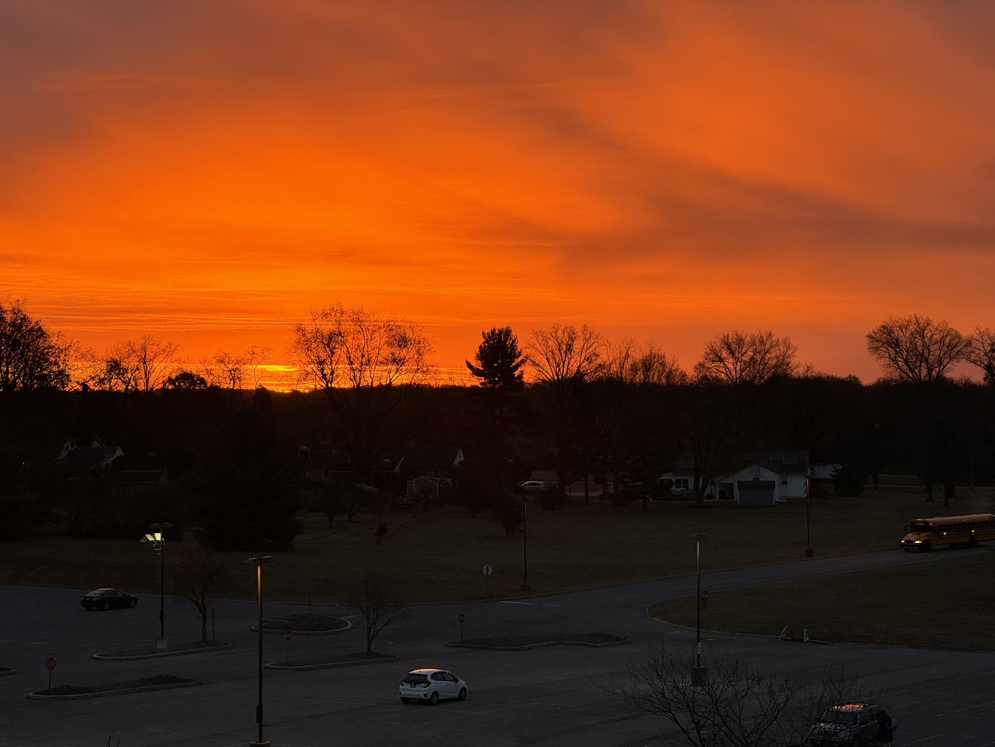 The sun rises over North Penn High School  on November 15, 2024. Warmer Octobers and Novembers could be one of many signals of climate change. The high school population represents the generation who is seeing the effects of climate change first hand. But who is taking action to correct it? 