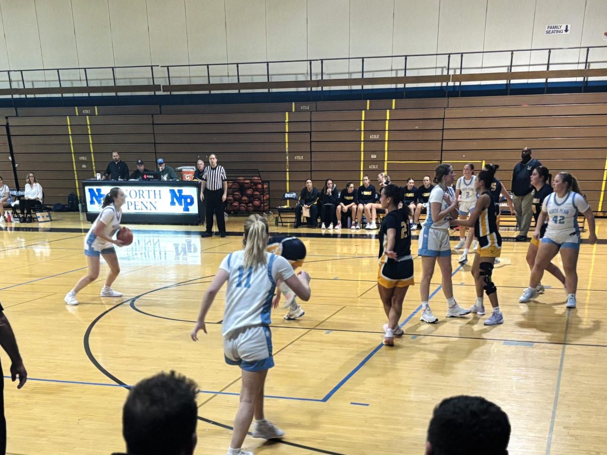 Sophomore Lily Brown sets up for a 3-pointer in the third quarter of North Penn's win over Unionville on Tuesday, December 10, 2024