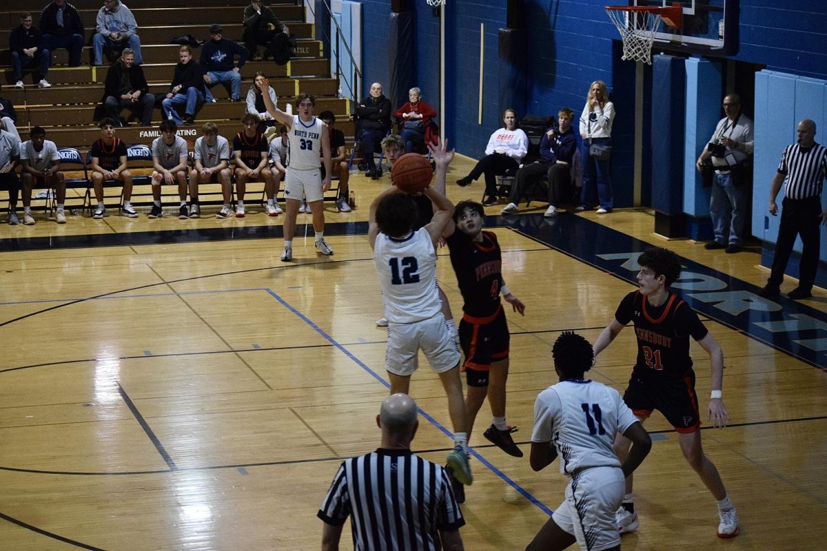 North Penn's Nolen Foust shoots a mid-range jumper in Saturday's matchup against Pennsbury.