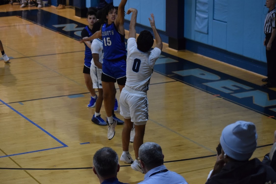 Ahmaar Godhania pulls up for a corner 3 in a game against Central Bucks South.