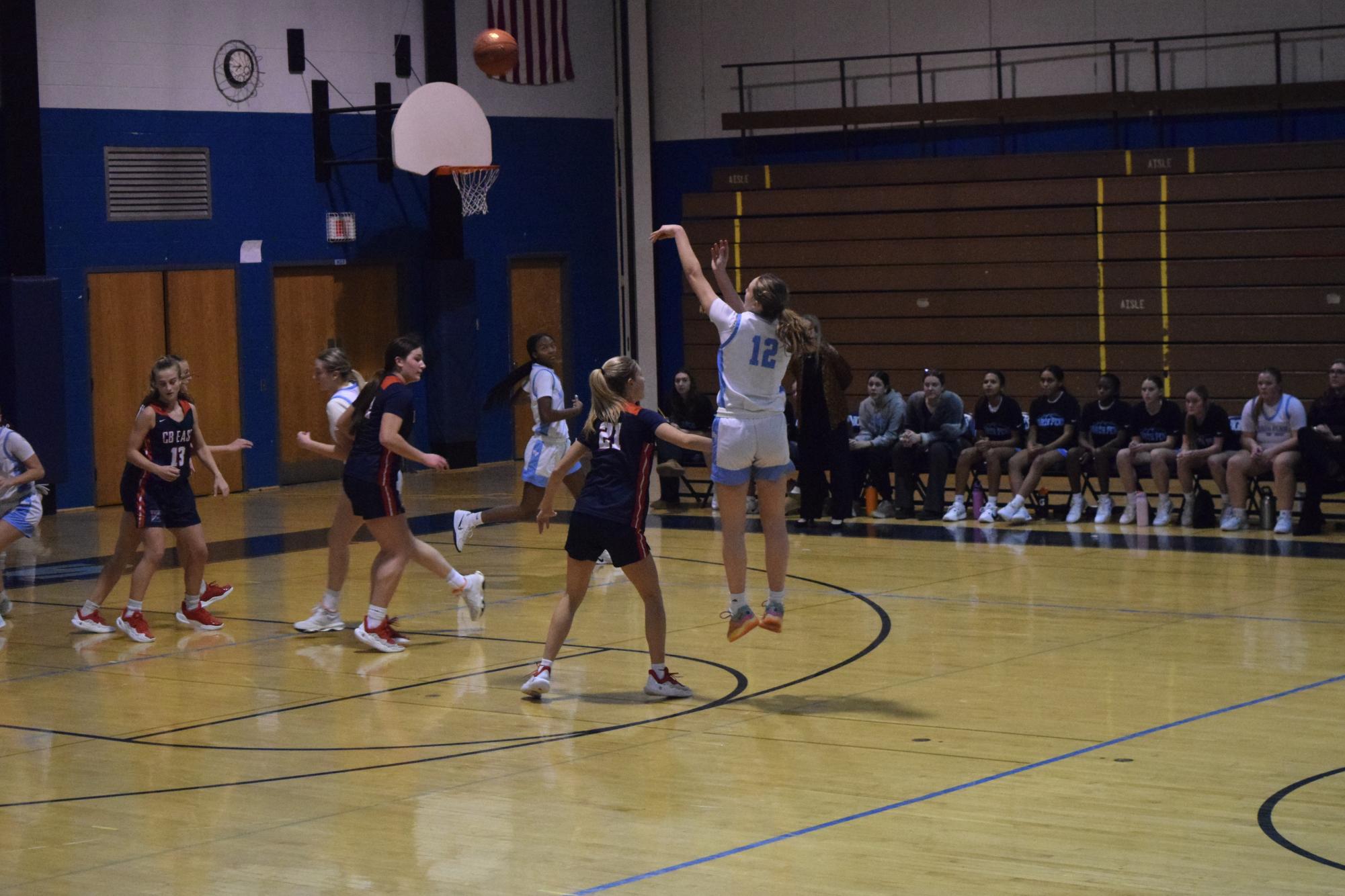 North Penn sophomore Lily Brown shoots a 3-pointer from the top of the key in Tuesday's matchup with Central Bucks East.