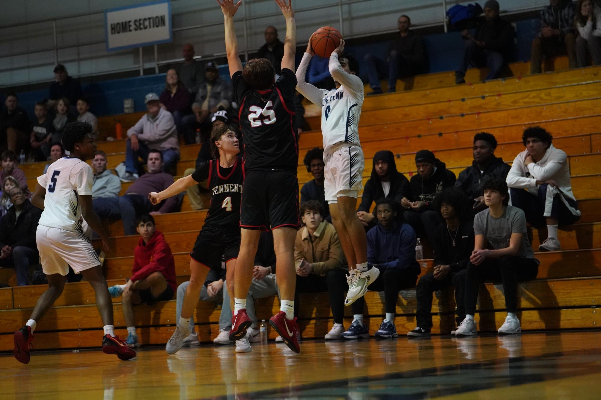 Ahmaar Godhania shoots a fadeaway corner three.