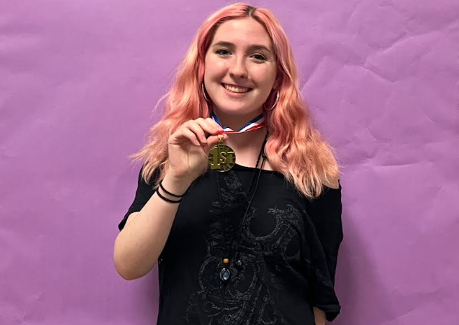 North Penn senior, Mac Buchanan, poses with her SkillsUSA first place medal 