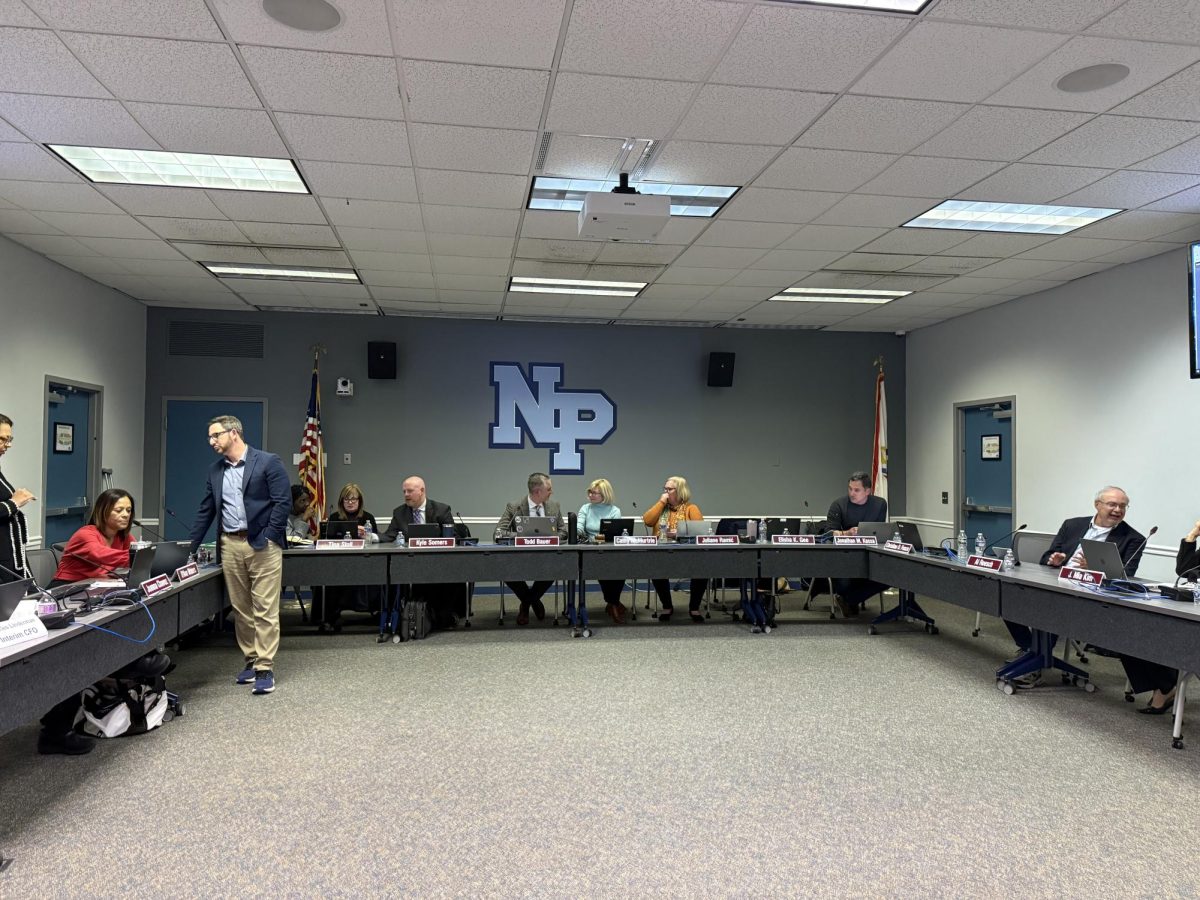 Board members preparing for April worksession at the ESC on April, 8th 2025